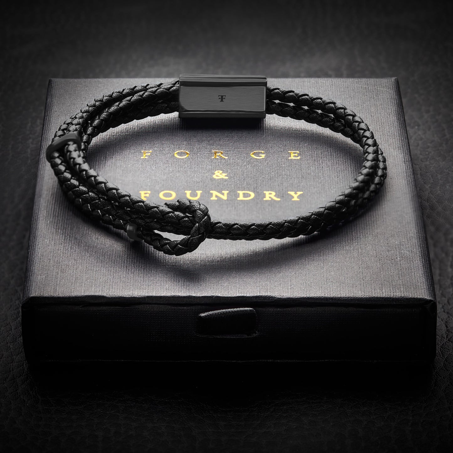 black adjustable leather bracelet on packaging
