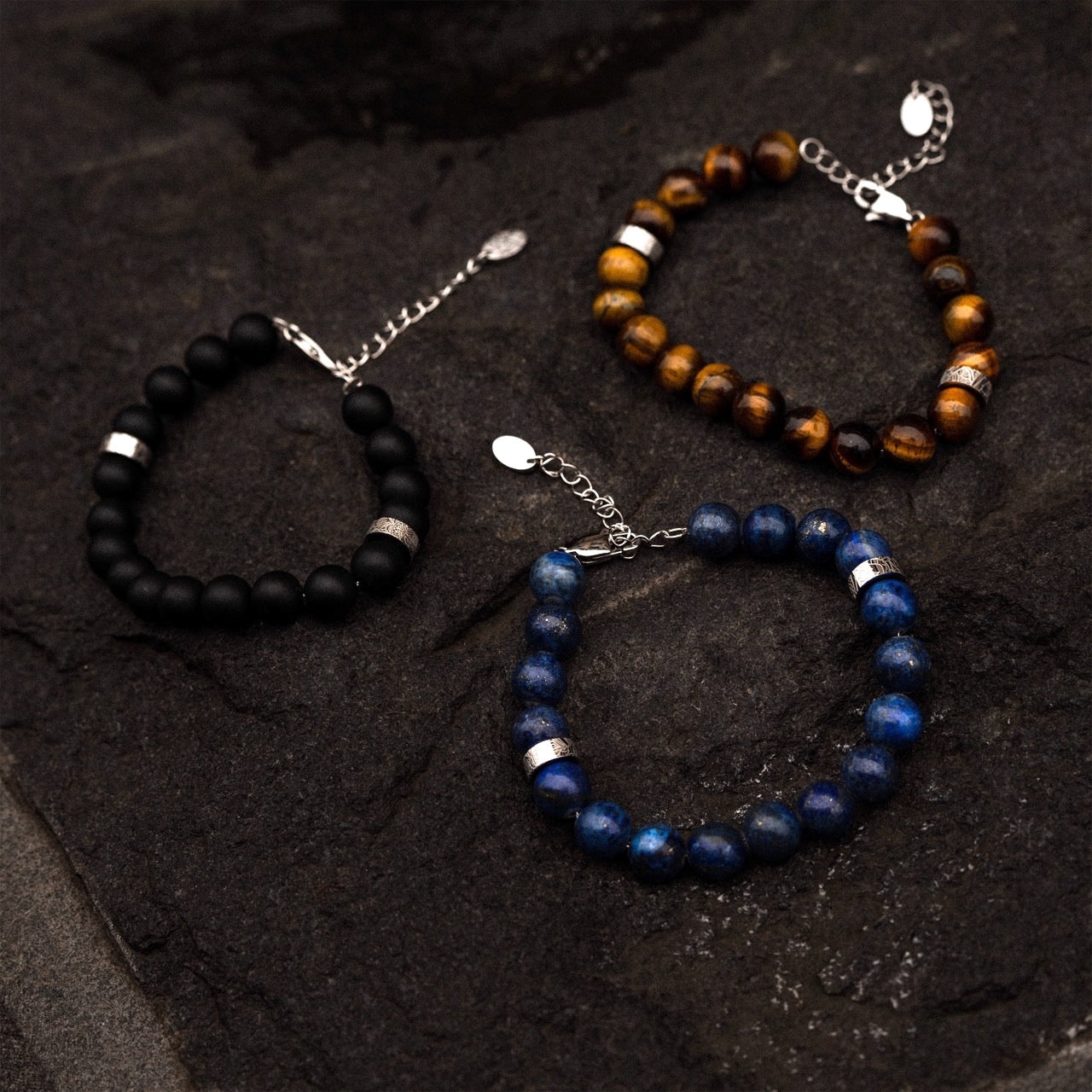 Men's black onyx adjustable bead bracelet with other bracelets