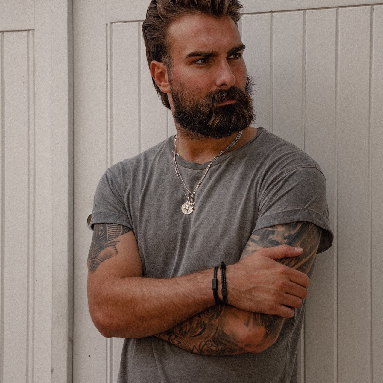 mens black adjustable leather bracelet on model