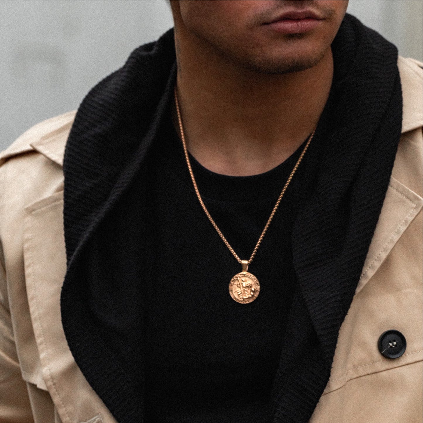 Mens gold saint christopher pendant on model