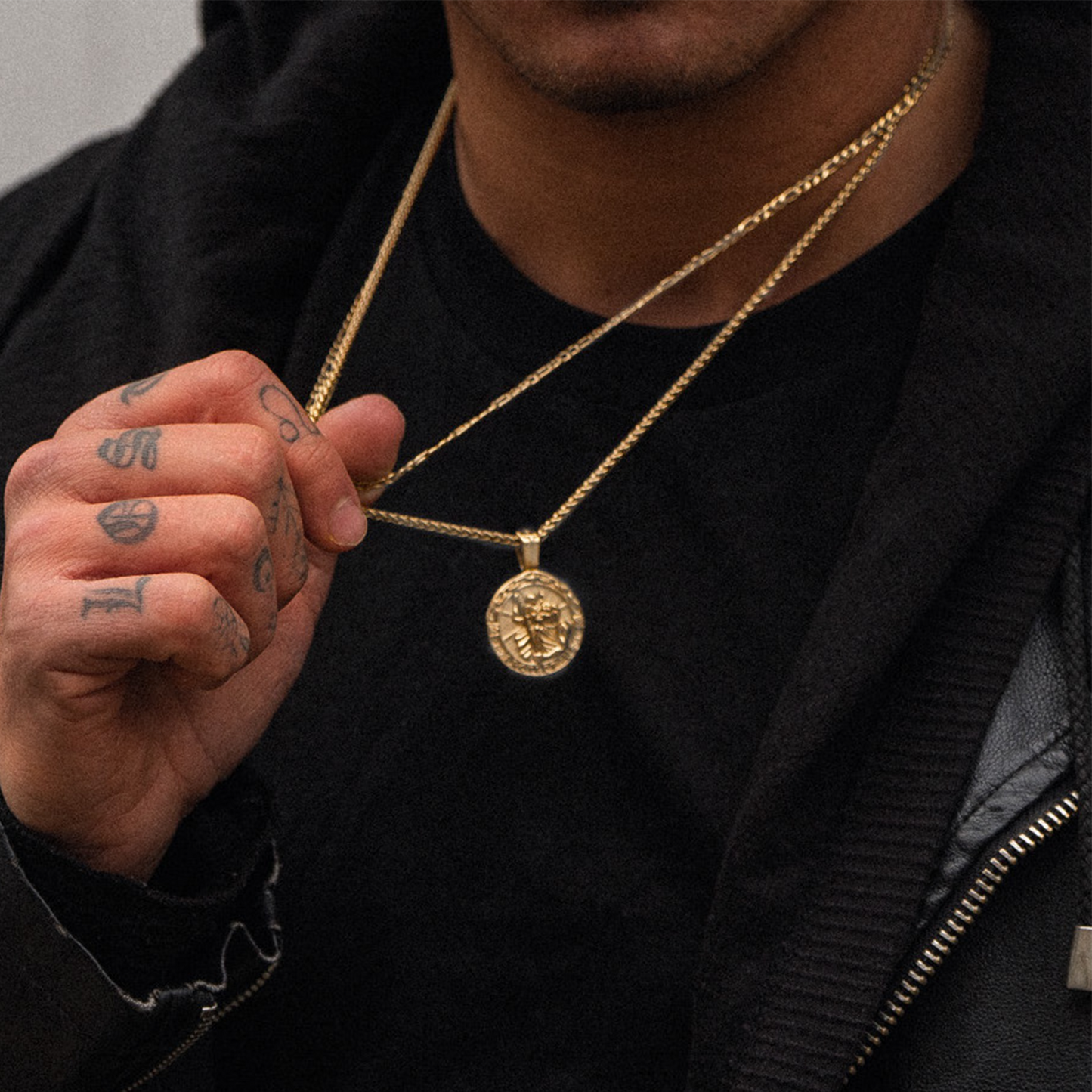 Mens gold saint christopher pendant on model