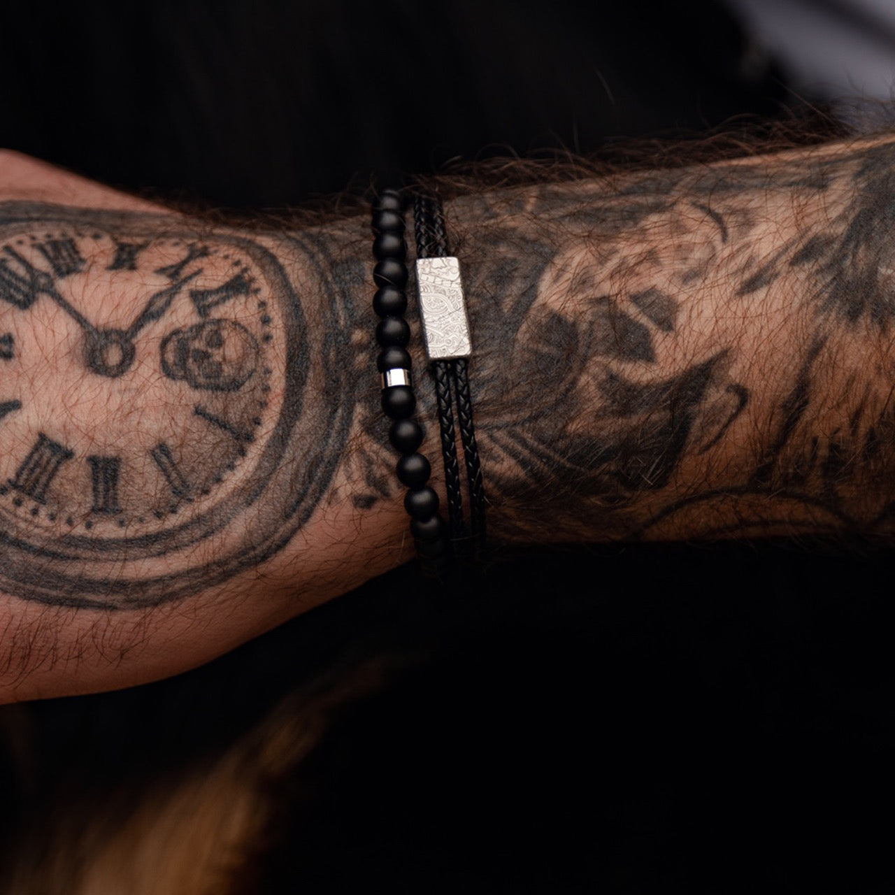 Men's minimalist etch leather bracelet and mm onyx bead bracelet on model