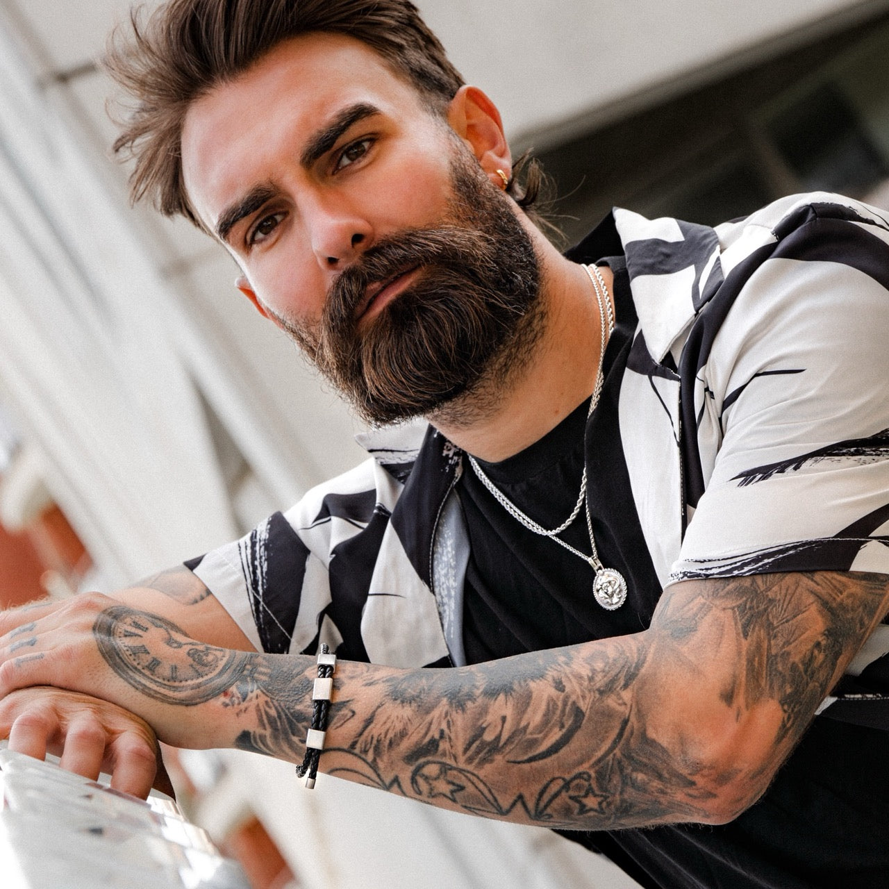 Men's silver Virgo pendant necklace on model