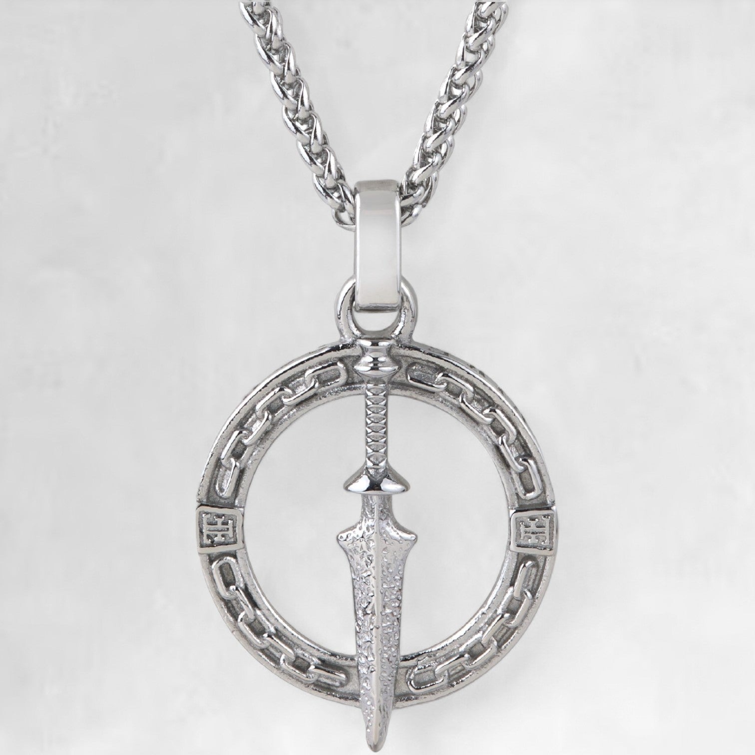 Men's silver dagger pendant necklace