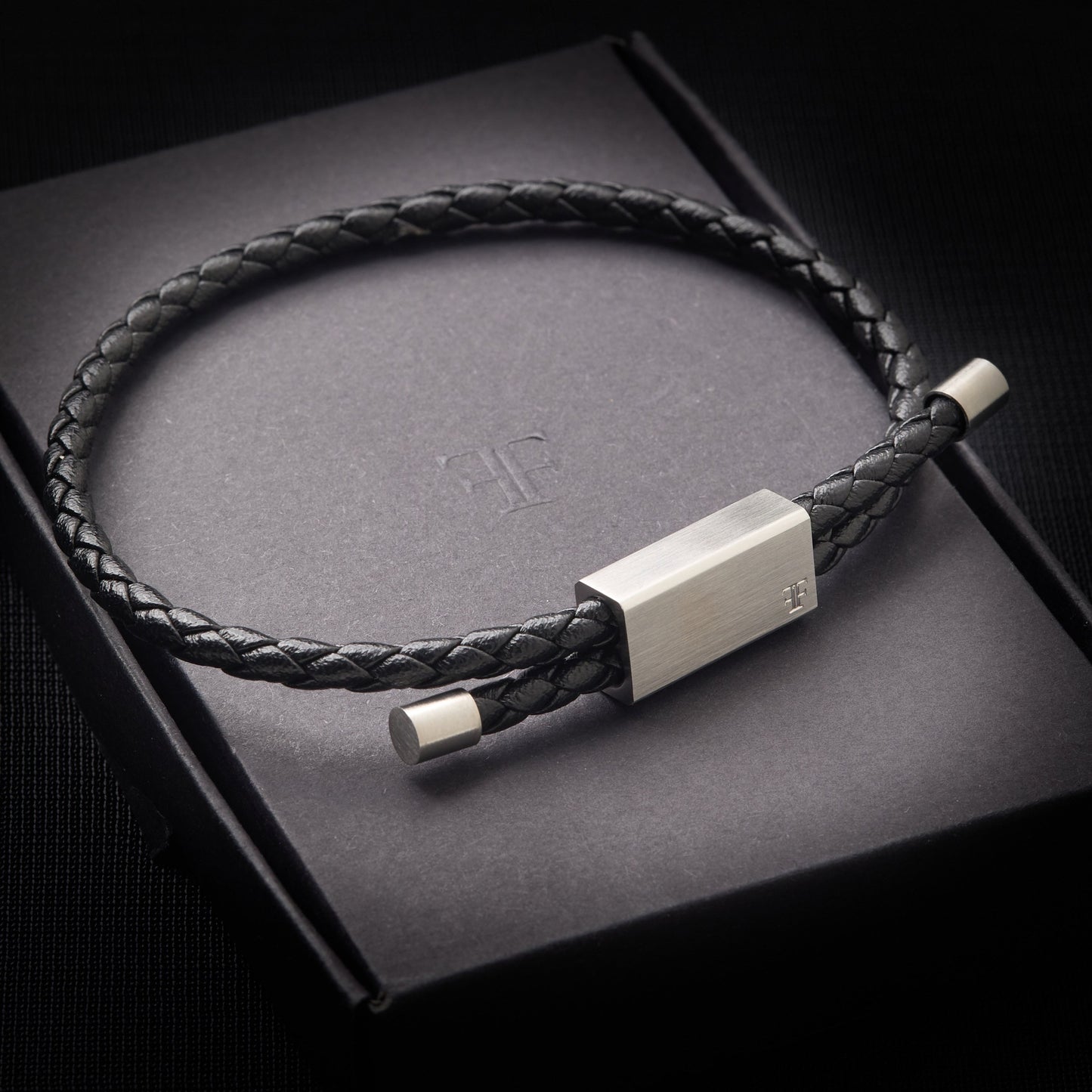 Men's adjustable leather bracelet with silver clasp