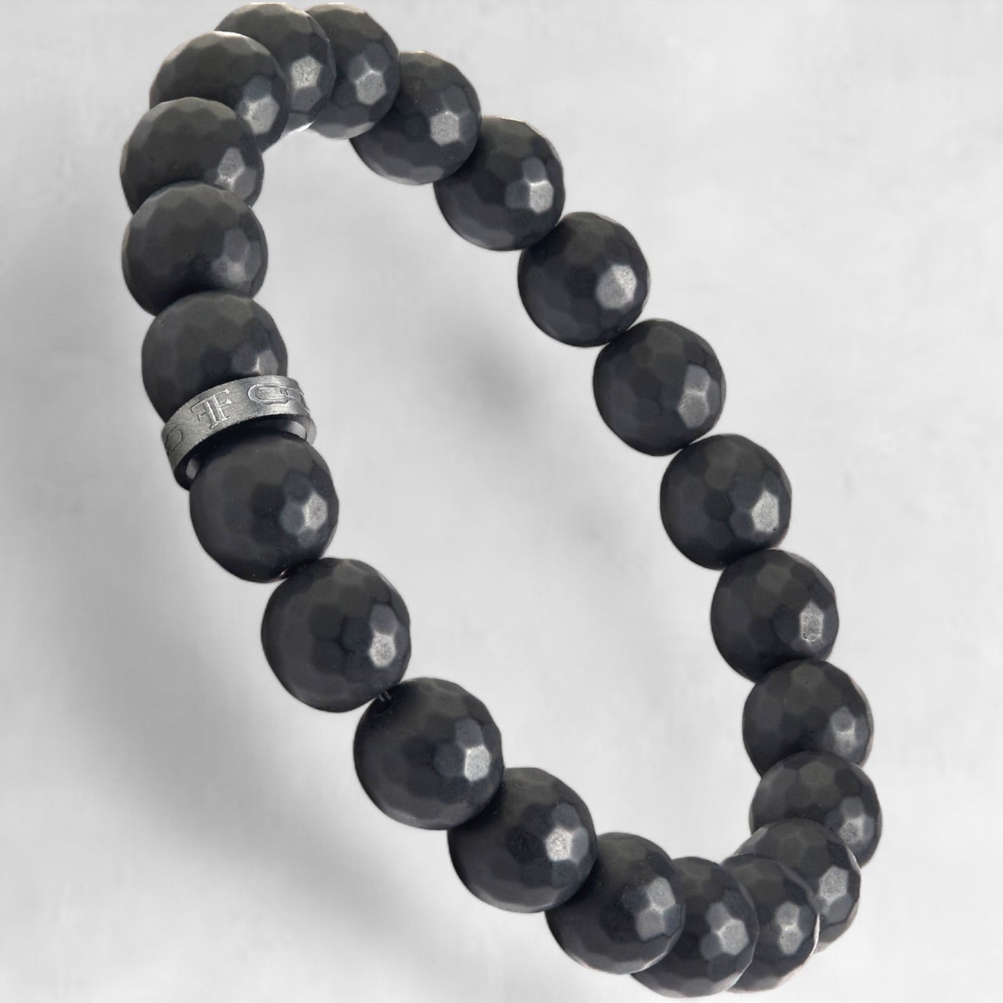 Men's faceted black bead bracelet with black accent
