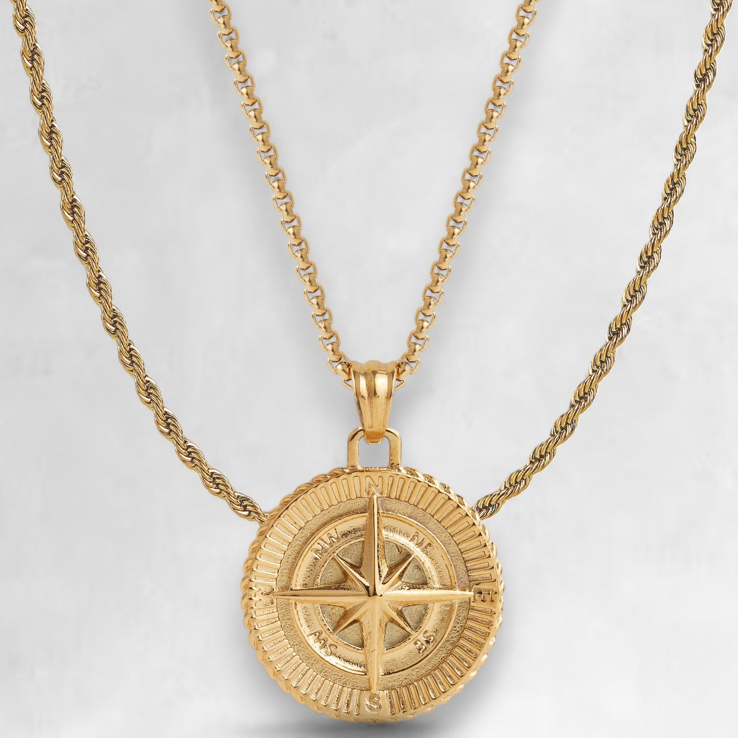 Men's gold compass pendant and rope chain necklace