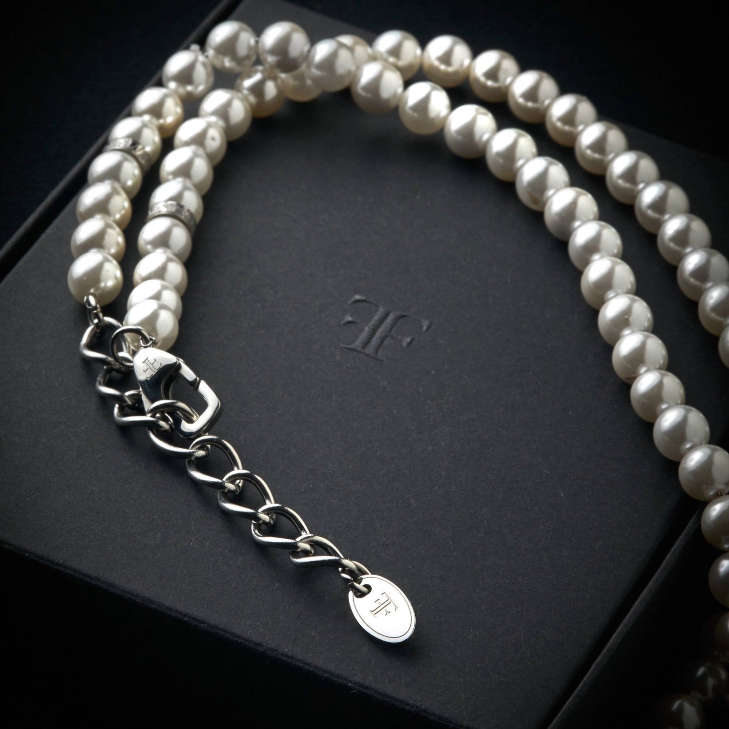 mens pearl necklace with silver beads on packaging
