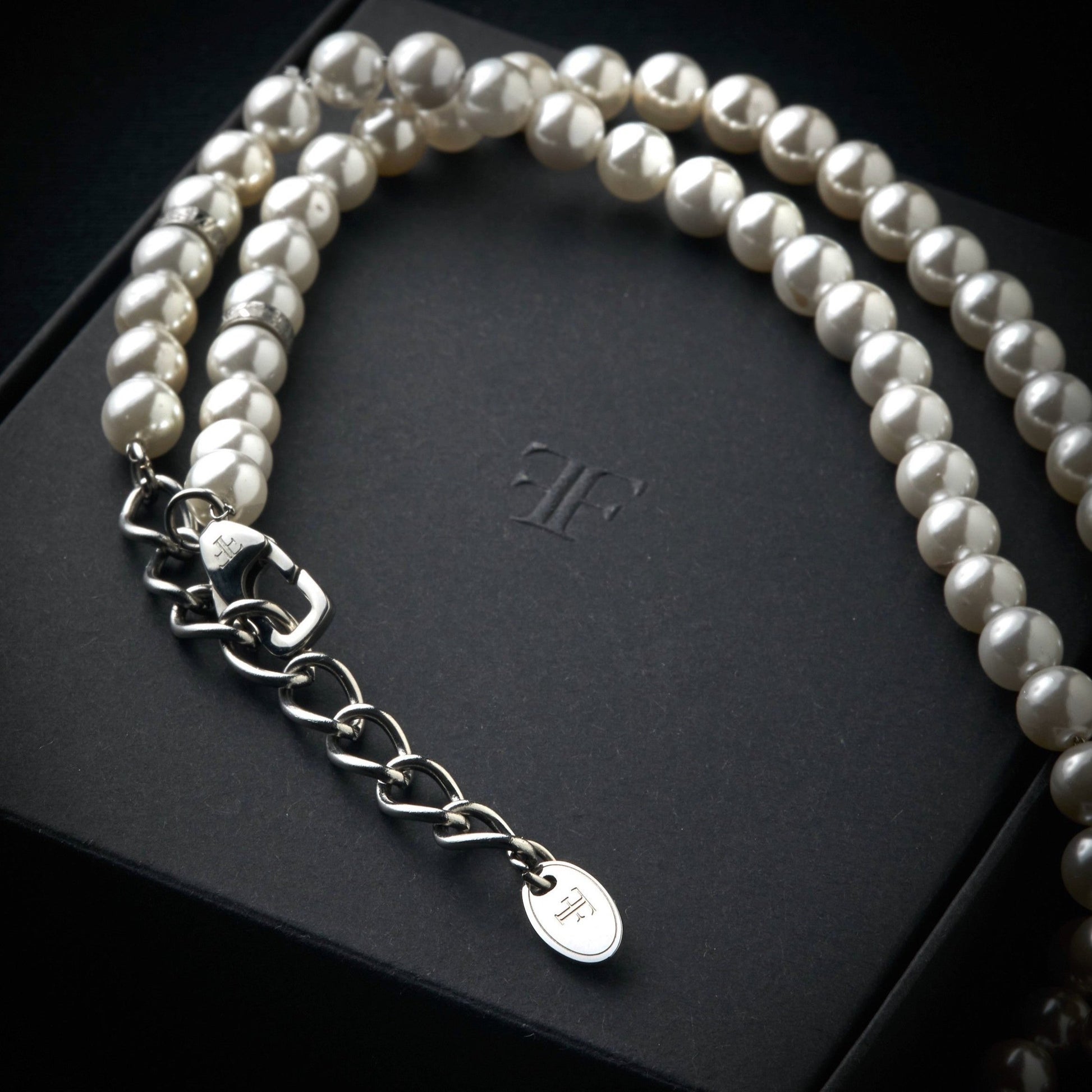 mens pearl necklace with silver beads on packaging