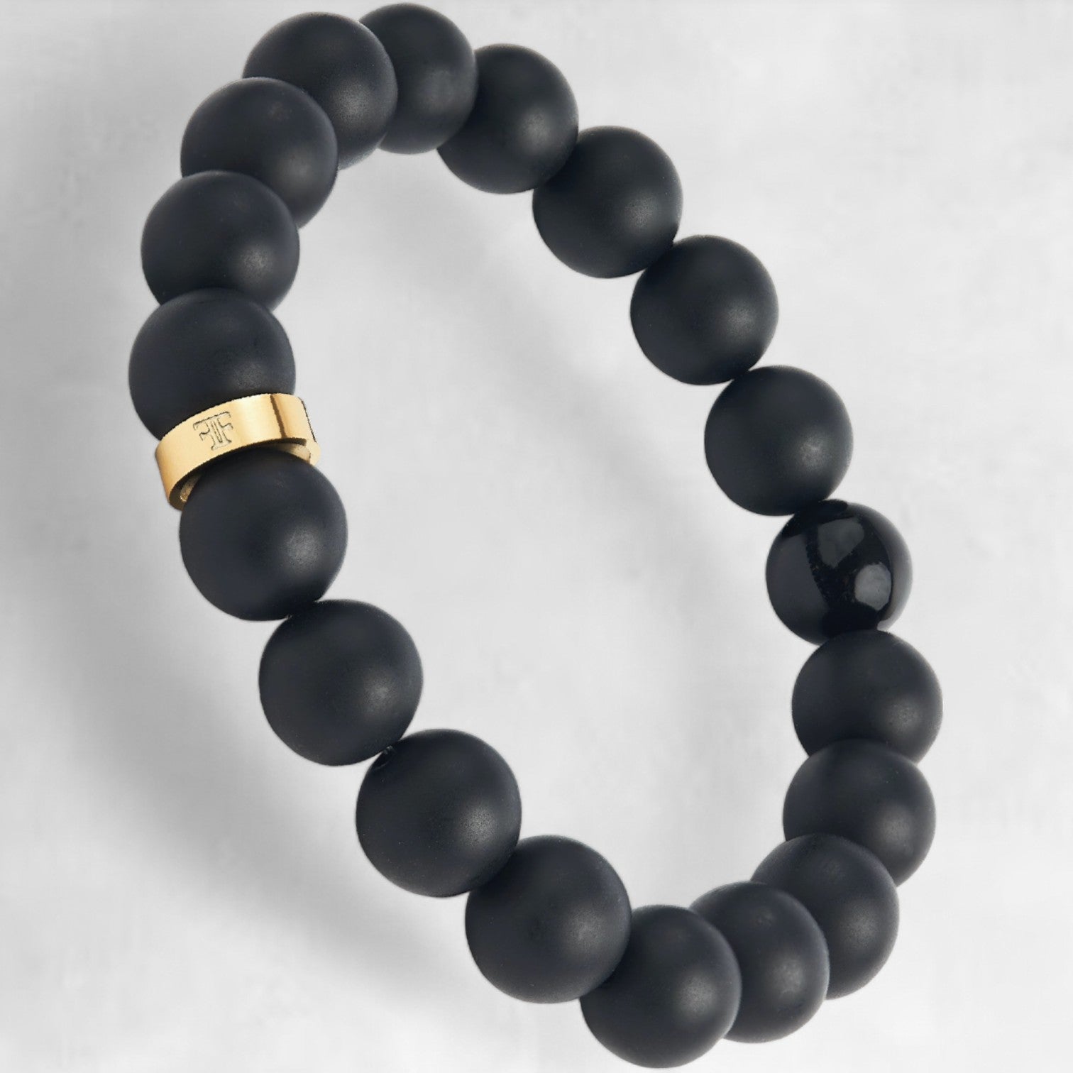 Mens gold and black onyx bead and stone bracelet