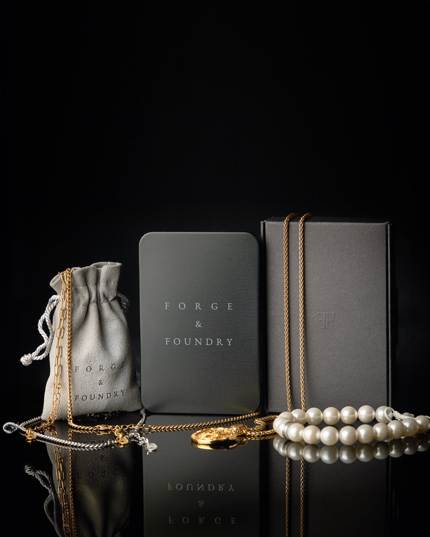 Men's jewellery packaging, including metal tin, pouch and outer box