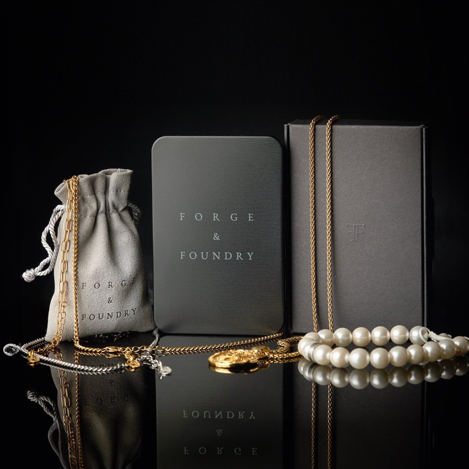 Men's jewellery packaging, including metal tin, pouch and outer box