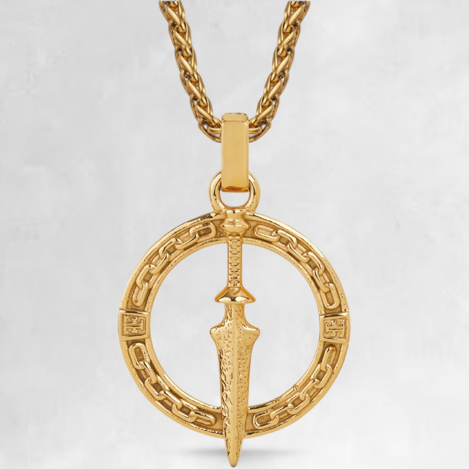 Men's gold dagger pendant necklace