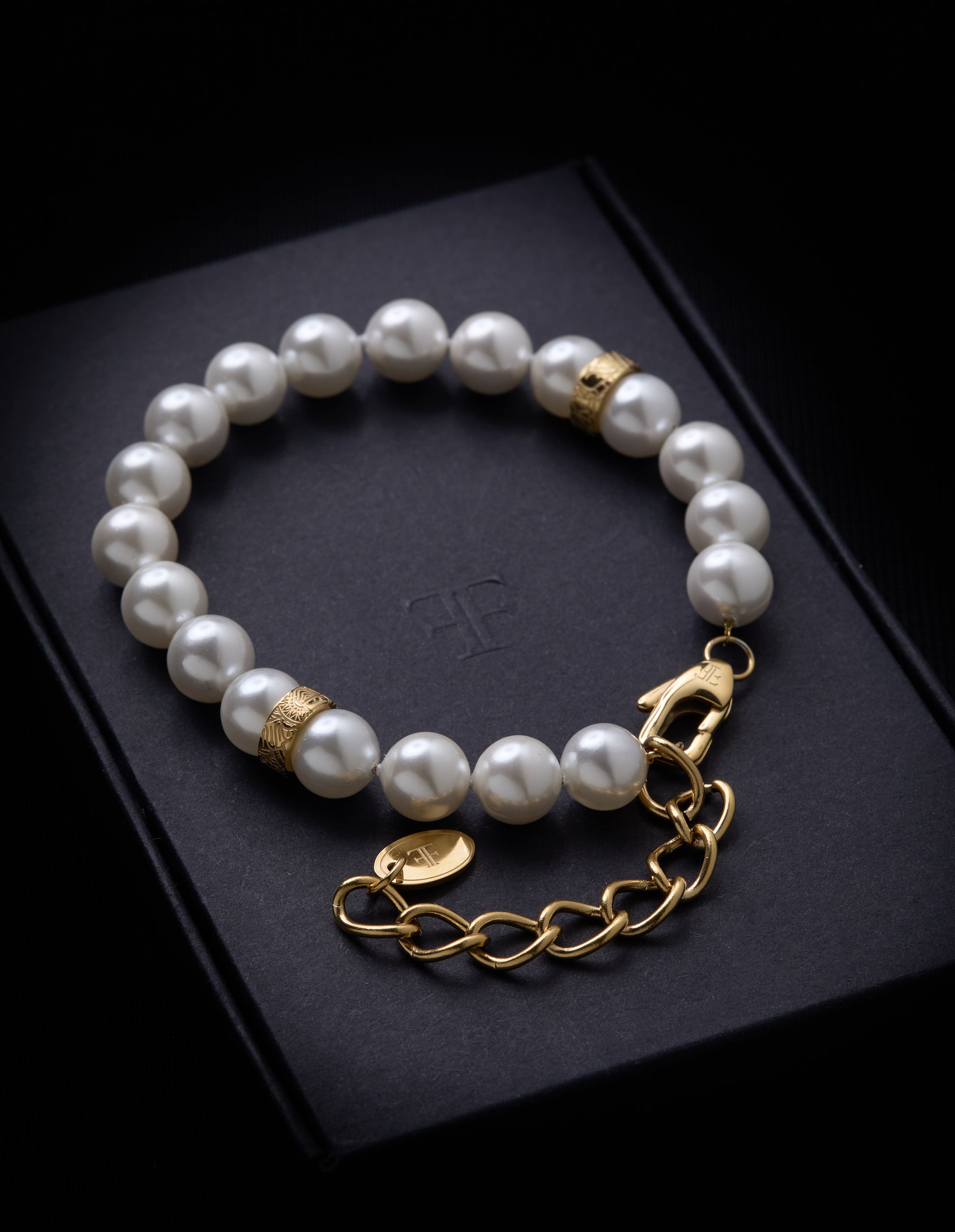 Men's adjustable shell pearl bracelet on packaging