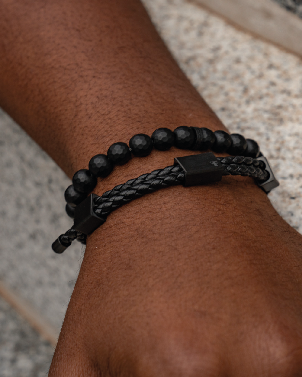 mens black faceted onyx bead stone bracelet on model 