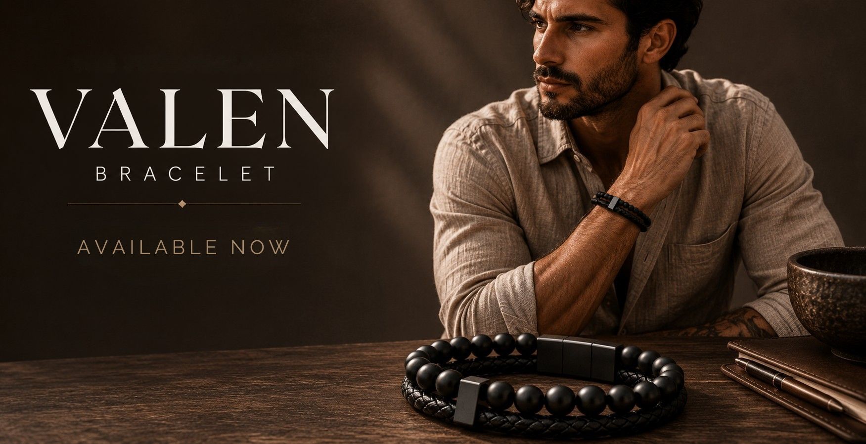 A man in a beige shirt sits at a wooden table wearing a black beaded bracelet, with another matching bracelet displayed in the foreground. The text 'VALEN BRACELET' and 'AVAILABLE NOW' appears on the left side of the image.