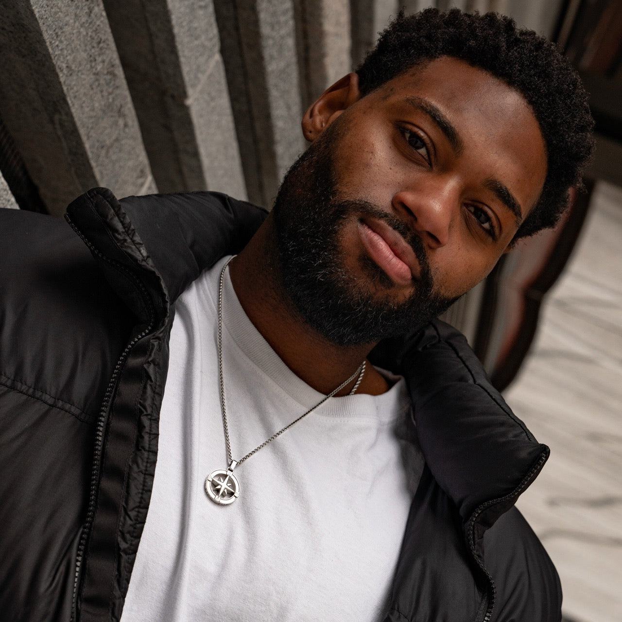 Men's North Star pendant and rope chain necklace on model