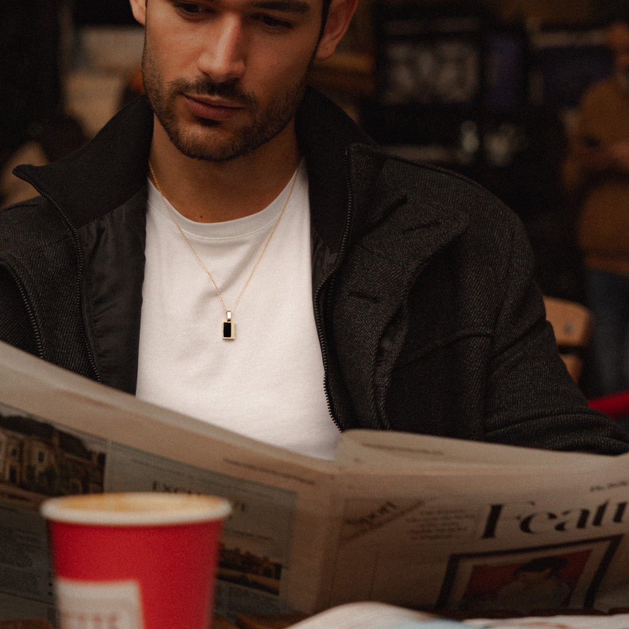 Men's minimalist silver onyx inlay pendant necklace on model