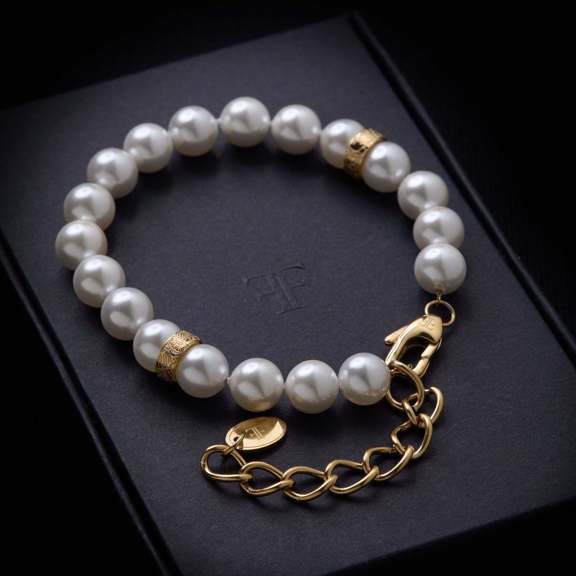 Men's adjustable shell pearl bracelet on packaging