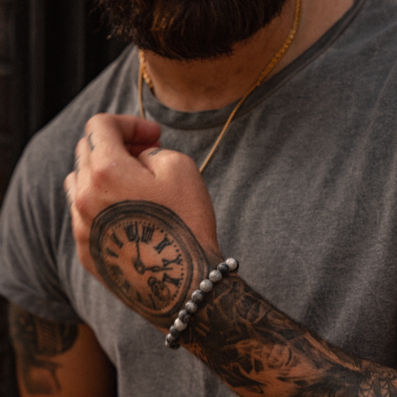 Men's adjustable 8mm jasper bead bracelet on model