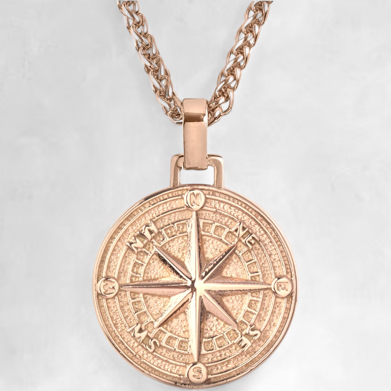 Men's rose gold compass pendant necklace