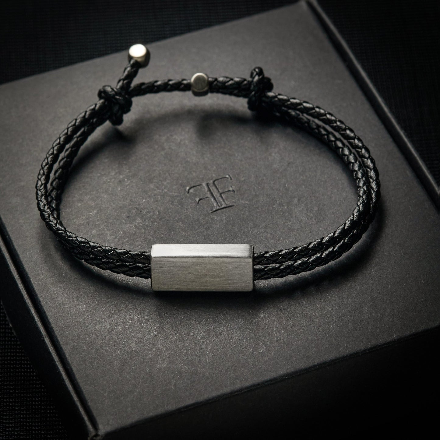 mens leather plain silver bracelet on packaging