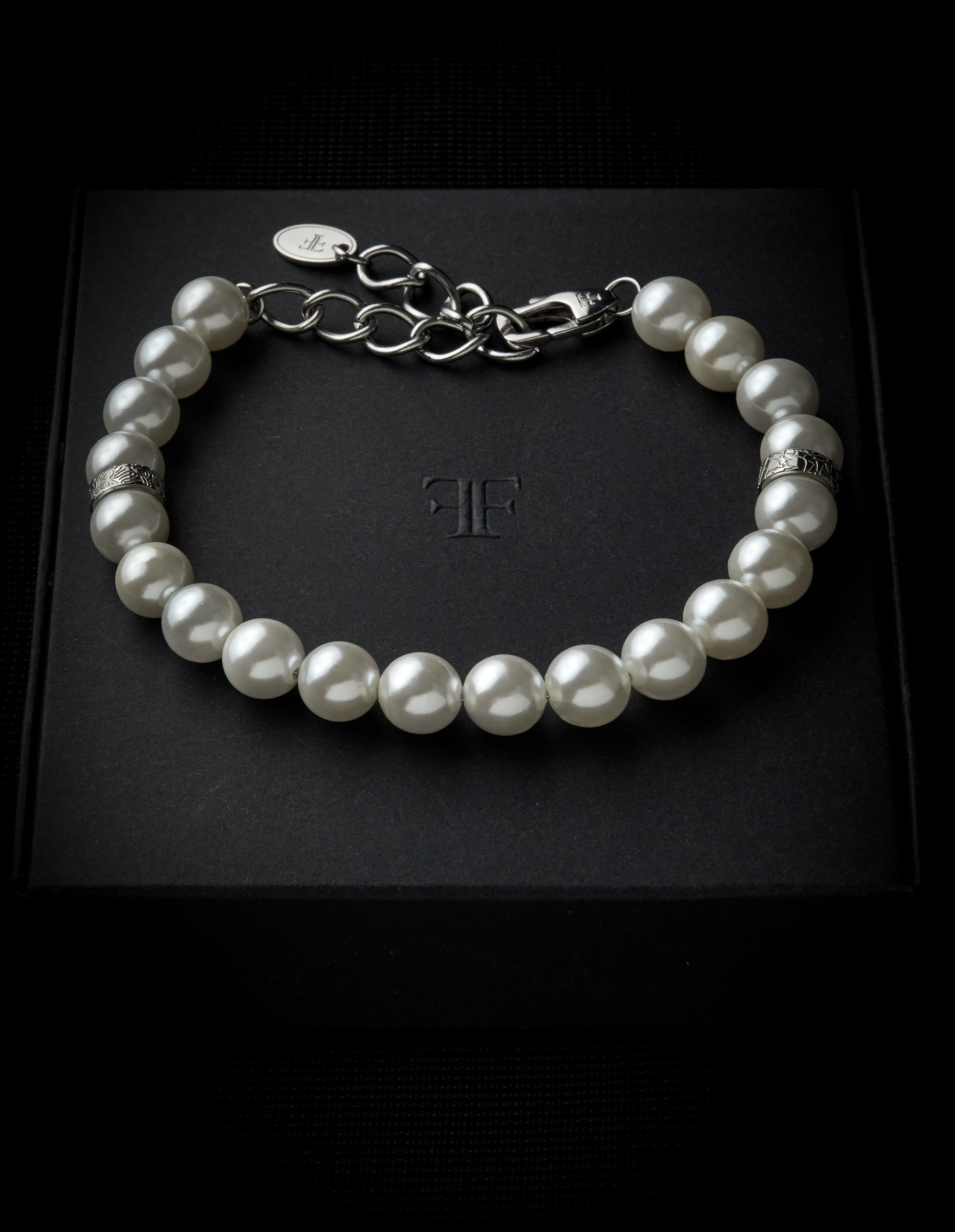 Men's adjustable shell pearl silver bracelet on packaging