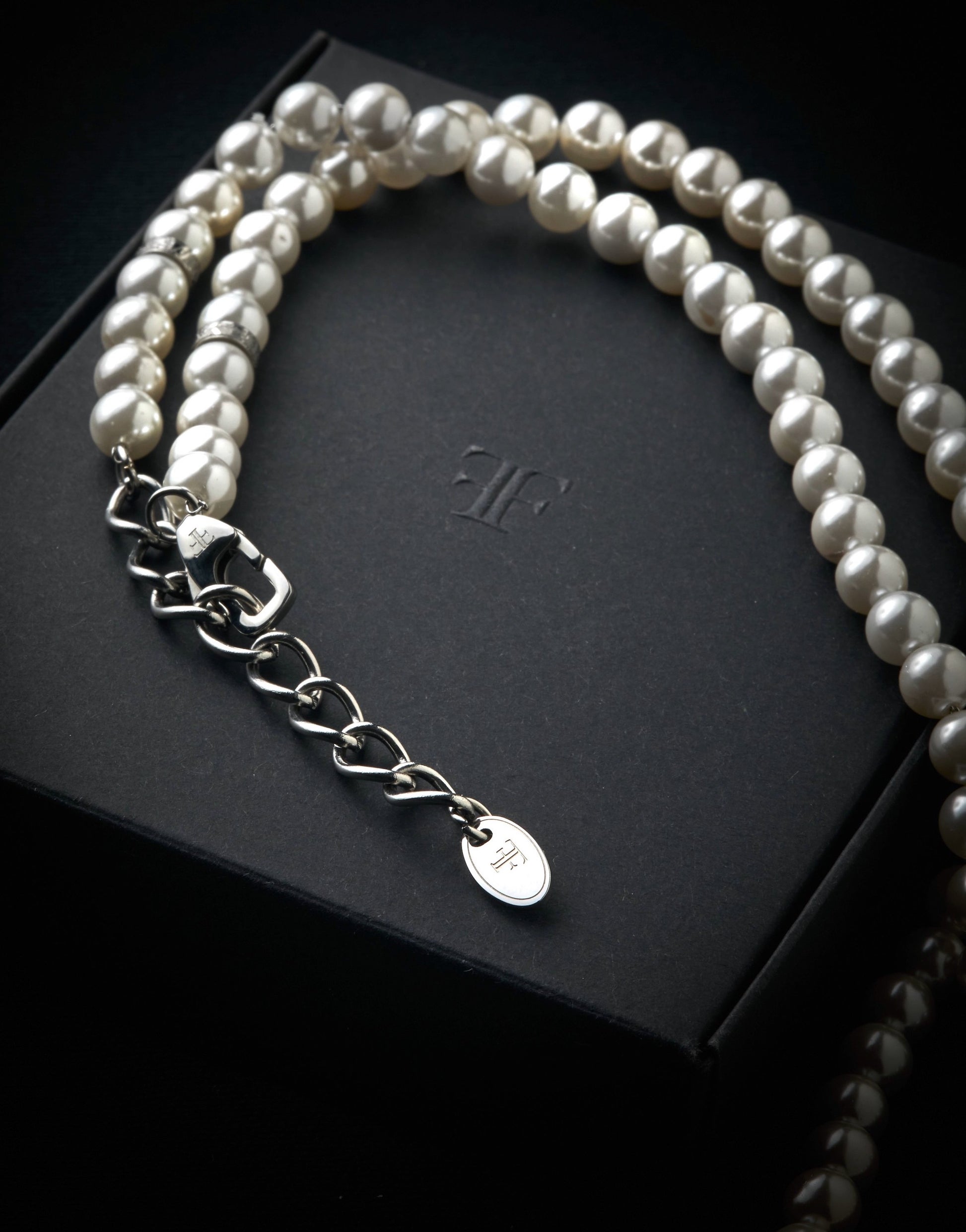 mens pearl necklace with silver beads on packaging